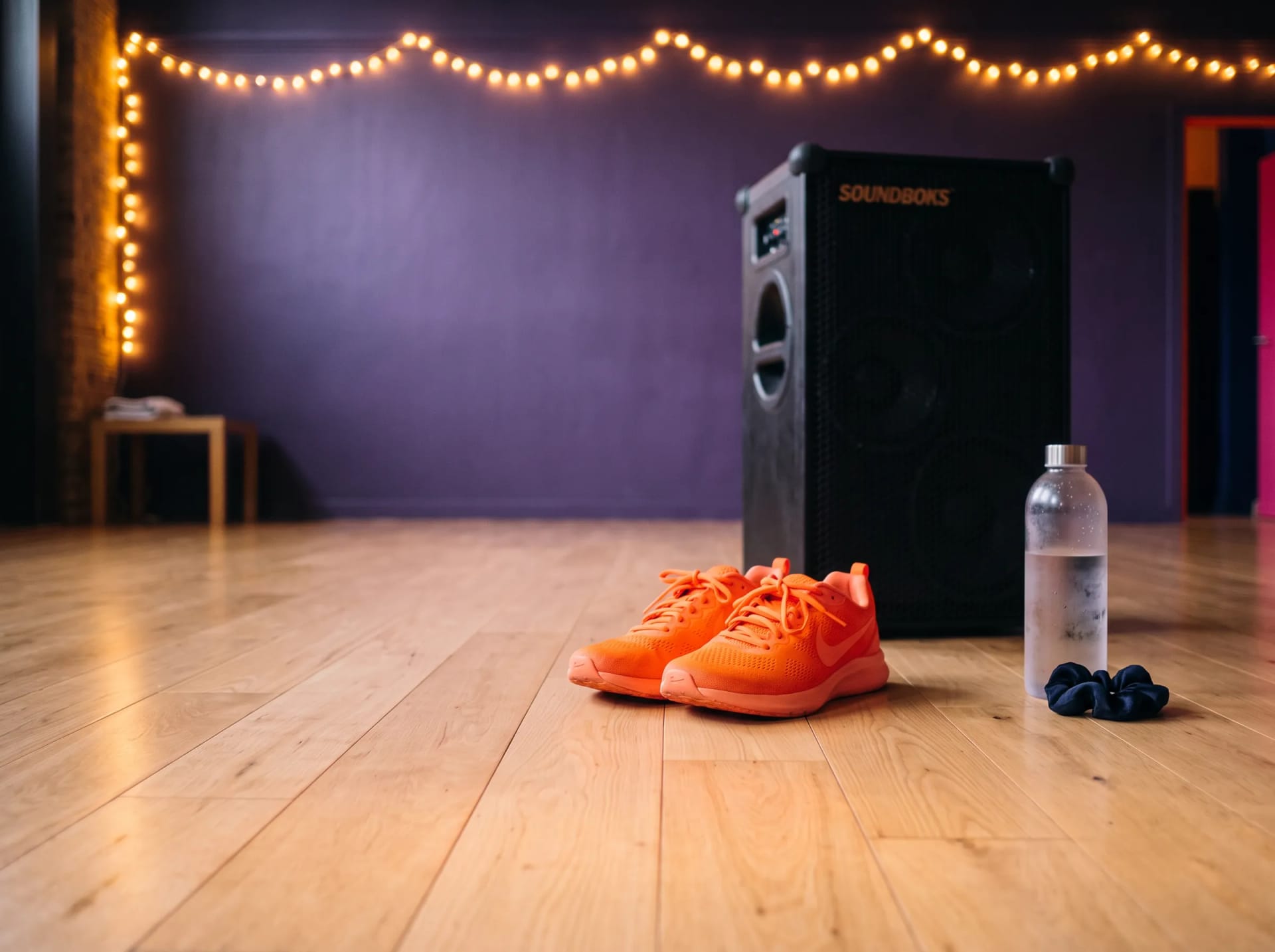 A pair of trainers beside the class speaker at the Pulse and Shine studio in Peckham, London